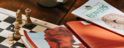 Playing Chess and reading books in the jungle