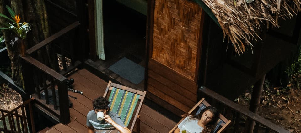 Man relaxing in a cozy treehouse in Khao Sok Jungle