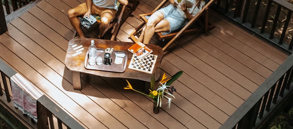 Woman relaxing in a cozy treehouse in Khao Sok jungle
